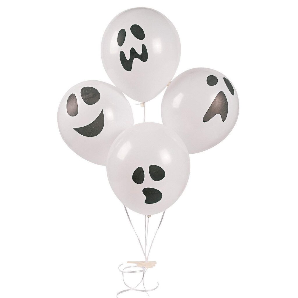 White balloons with ghost faces drawn on them.