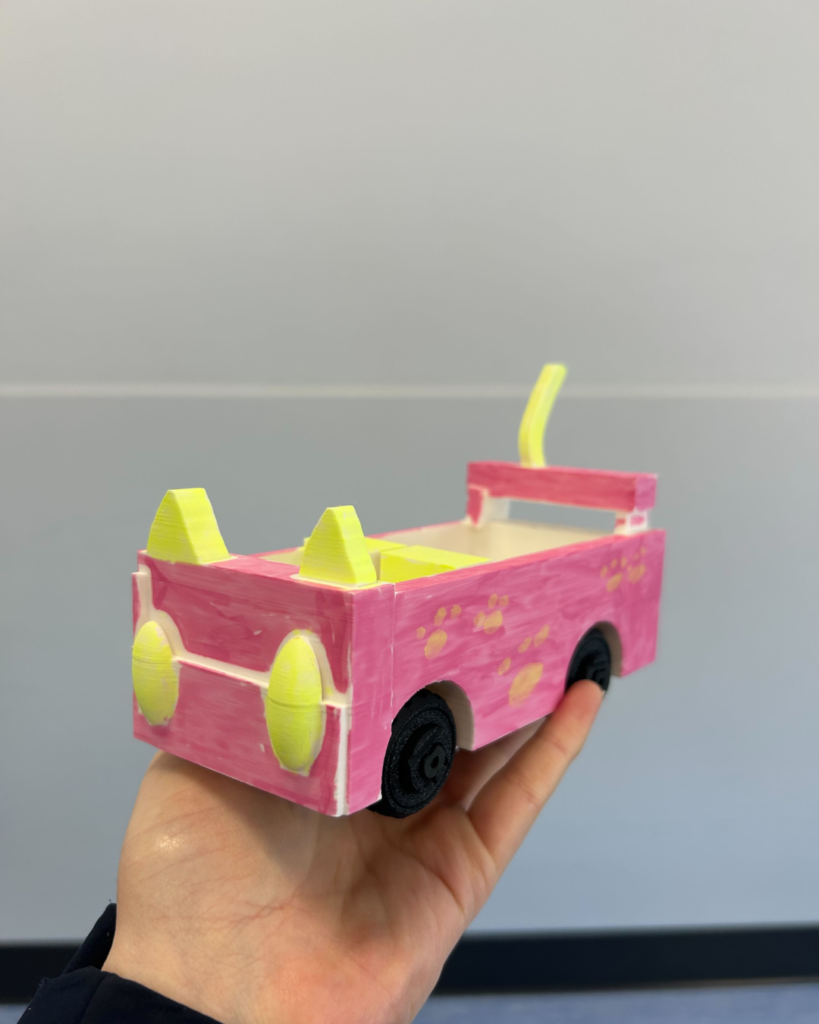 A kid working on a projectA 3D printing car from our 3Dprograms for kids