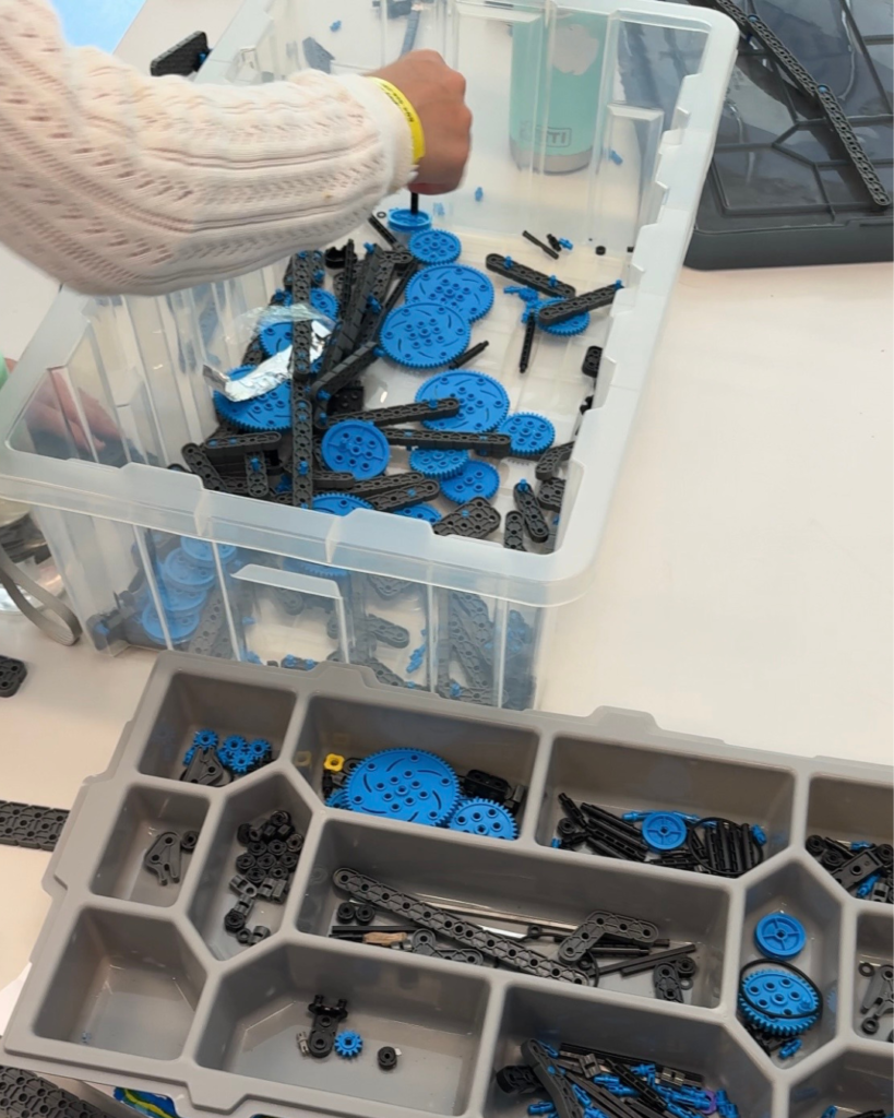 A kid working on a robotics project