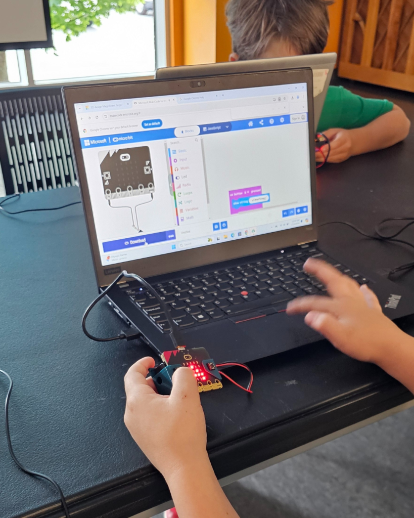 Kids working on a project during one of our AI program for kids. (1)