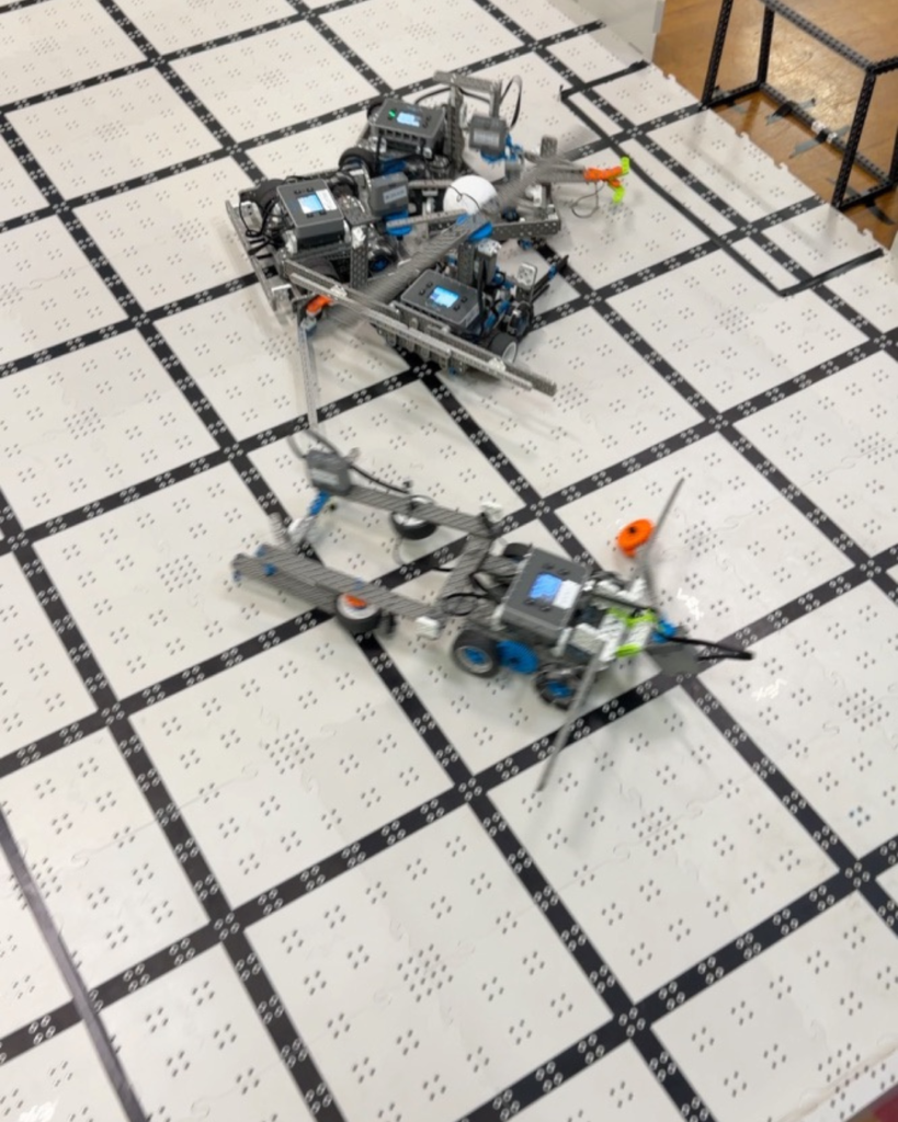 Kids playing robot soccer (2)